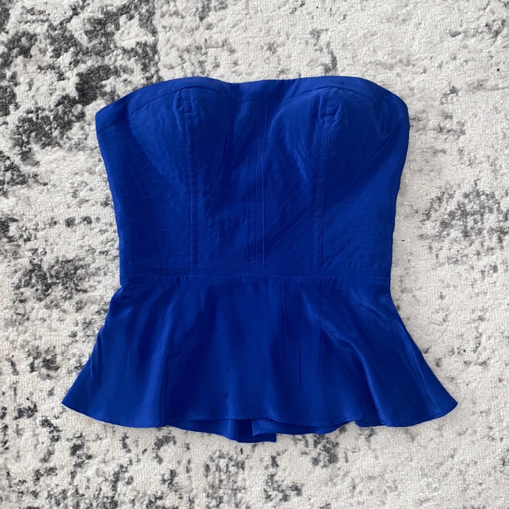 BEBE size small silk strapless top new with out tags